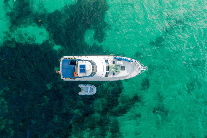 a charter vessel in the clear water of Rottnest Island