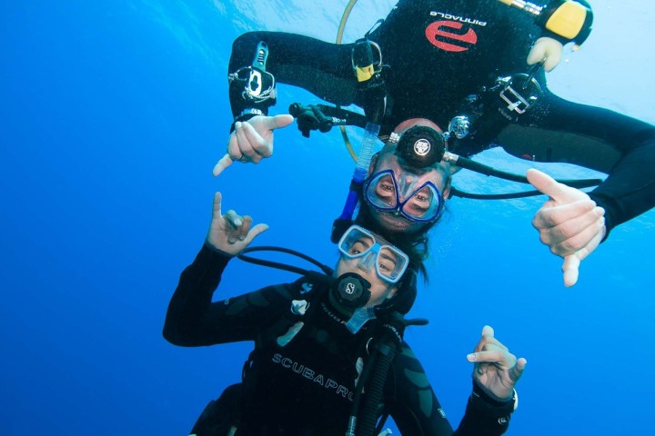 a group of people posing for the camera